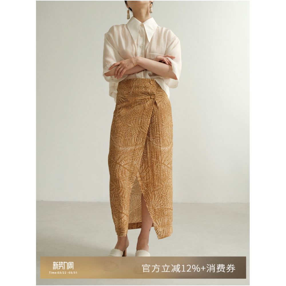 Hurry and grab this Only 20 pieces left in this last batch Resort style printed pure cotton pleated midi skirt with a chic slit and straight cut image 0