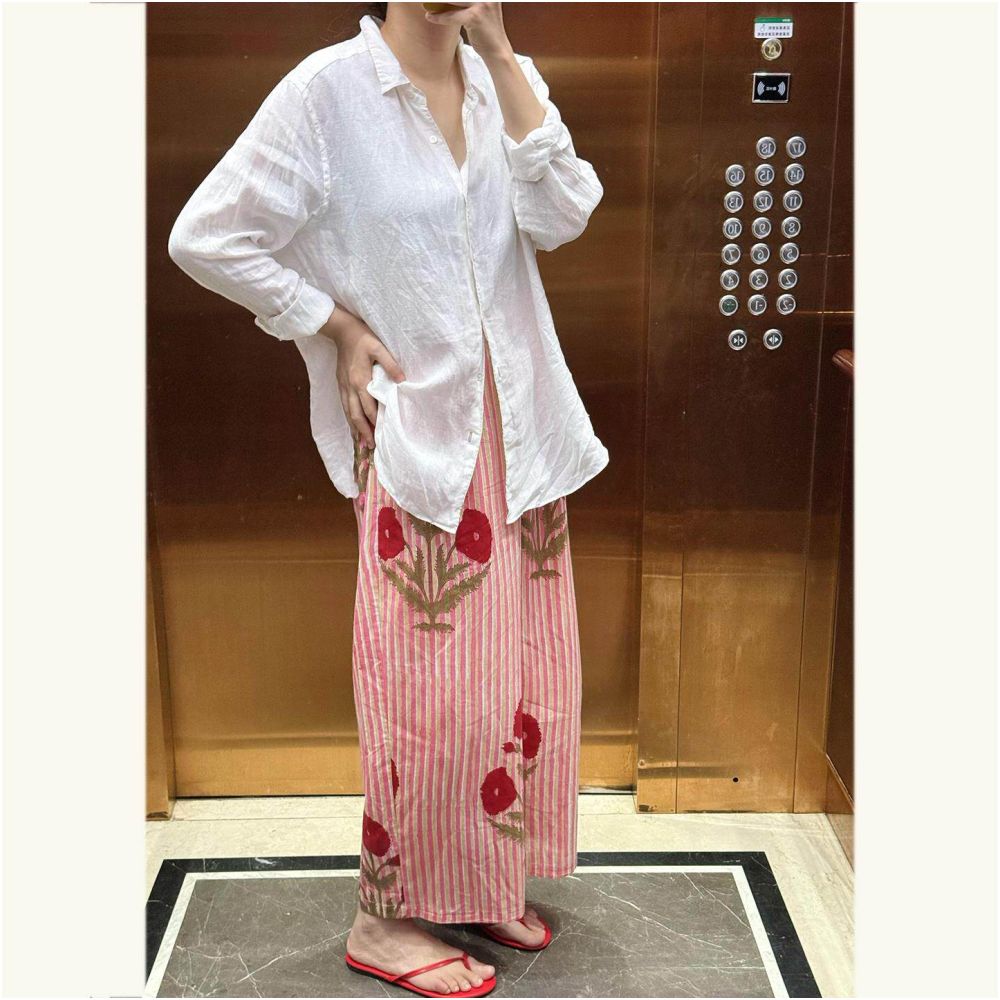 Early autumn relaxed and casual style retro pastoral vacation look lightweight floral print striped wide leg pants for women image 0