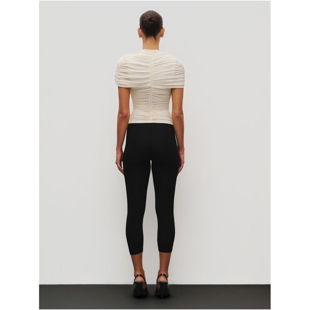paola min s sophisticated and minimalist white pleated turtleneck short sleeved T shirt for women featuring an asymmetrical design image 2