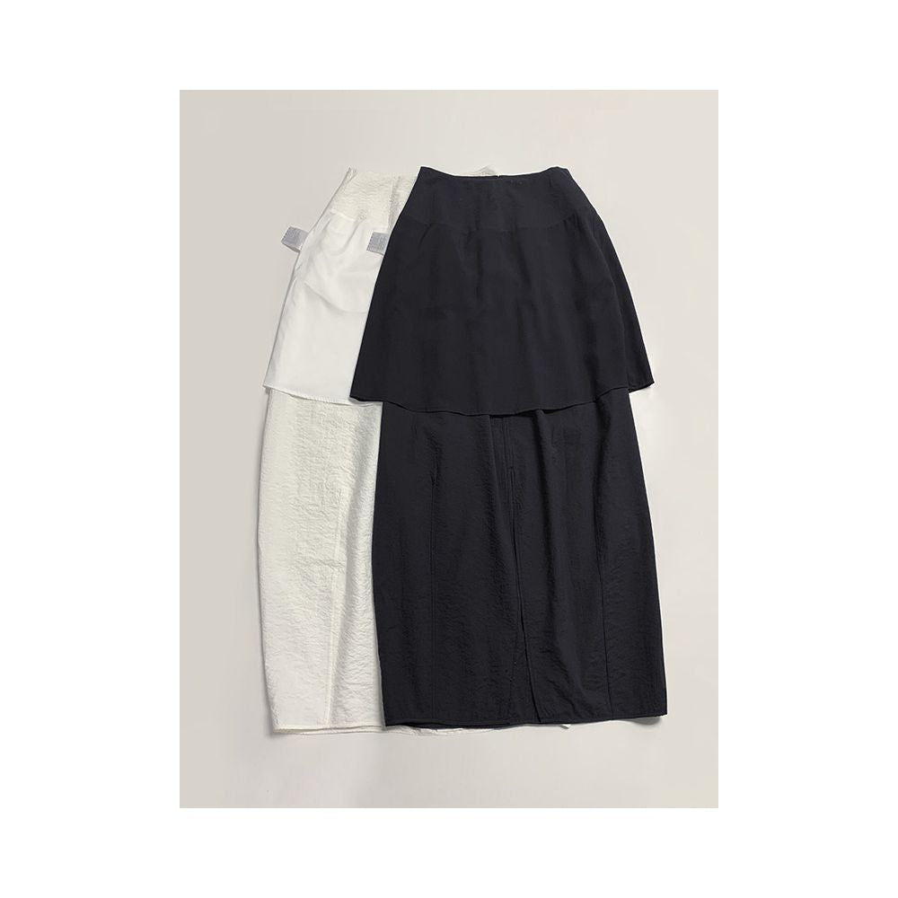 Minimalist stylish loose fitting high waisted slimming versatile silk curved midi skirt with light pleats and a slit design image 4