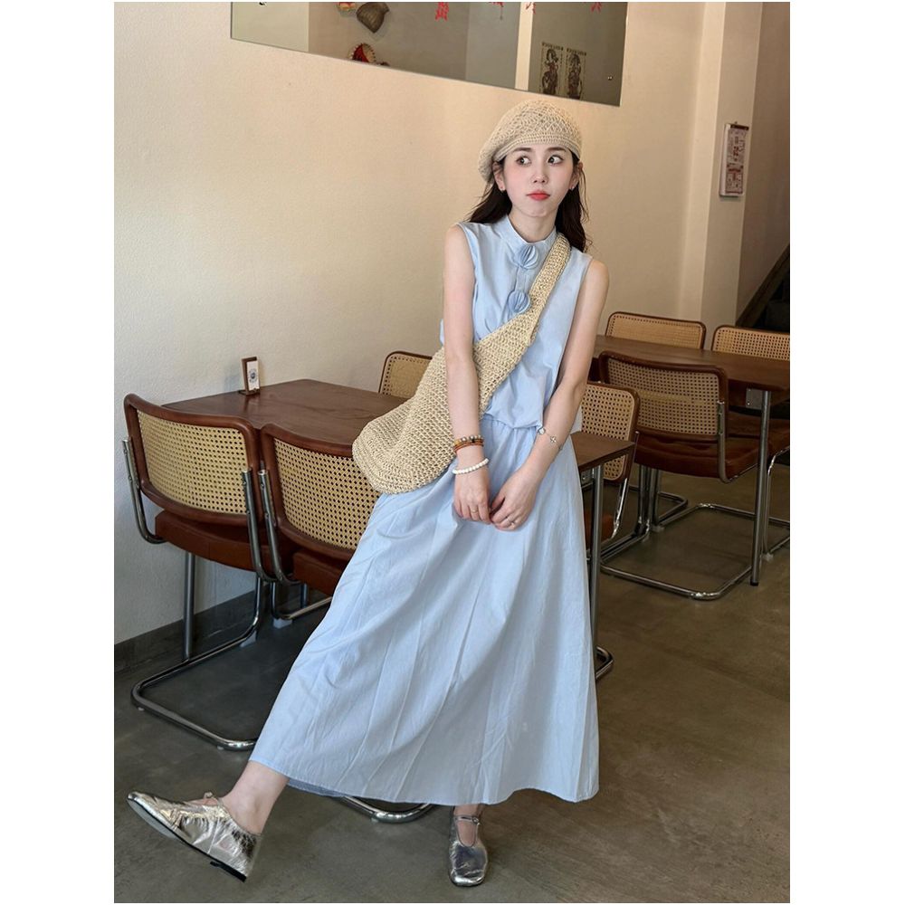 X Rose s elegant and sophisticated three dimensional floral vest and high waisted flowing maxi skirt set is a stunning Chanel inspired women s outfit image 1