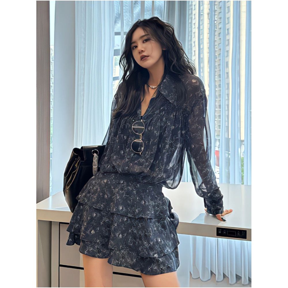 This year s popular trend is a beautiful two piece suit for women featuring a retro chic loose fitting printed sun protective shirt and skirt image 0