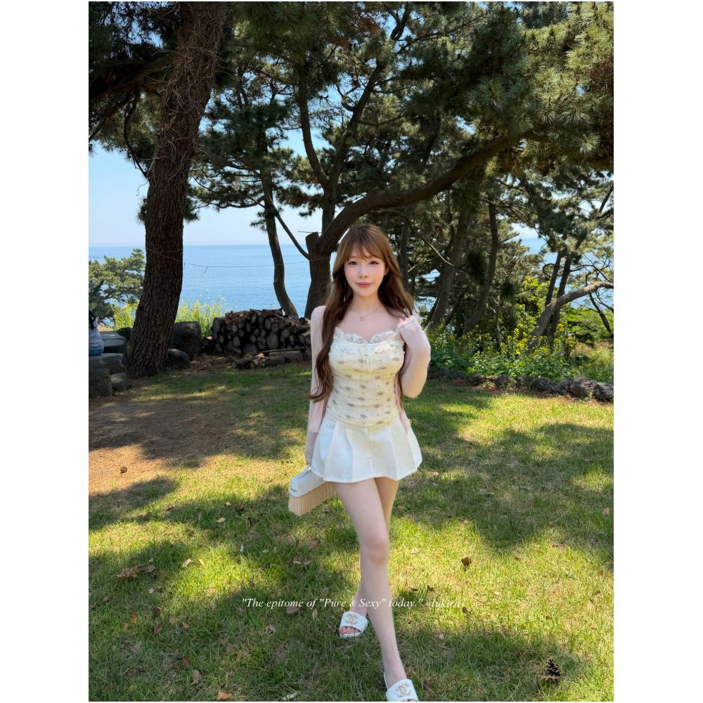 Lukira a light white lace trimmed pleated midi skirt for women perfect for summer and preventing wardrobe malfunctions image 2