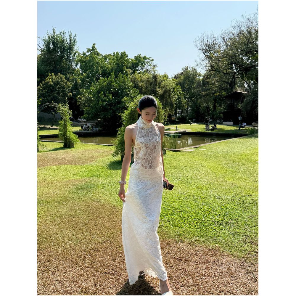 Rosie a beautiful young woman wears a see through alluring high necked backless lace trimmed top vest image 2