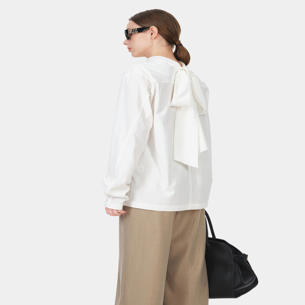 Marllen wears French retro style clothes with multiple ribbons bow ties white shirts loose casual tops for women in spring image 5