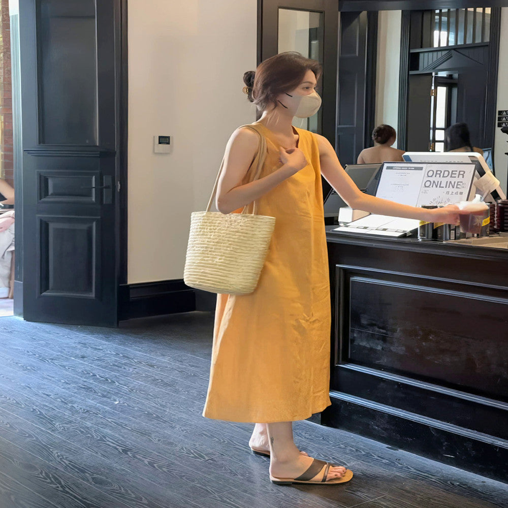 Summer sleeveless dress with a small stature and a high end feel featuring an apple shaped figure and a slimming effect exuding a casual French style vibe image 7