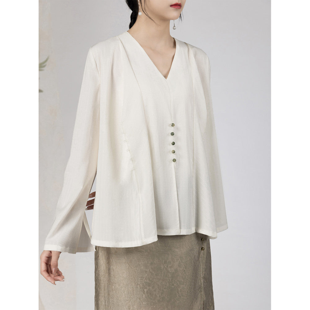 Yyan means new Chinese style white fake two piece shirt with V neck and autumn jade pearl buckle design long sleeved top for women image 10