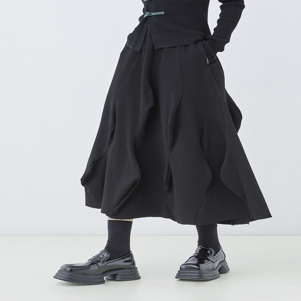 Original designer s black irregular half skirt for women in autumn and winter deconstructing waves and stitching medium length A line skirt image 25